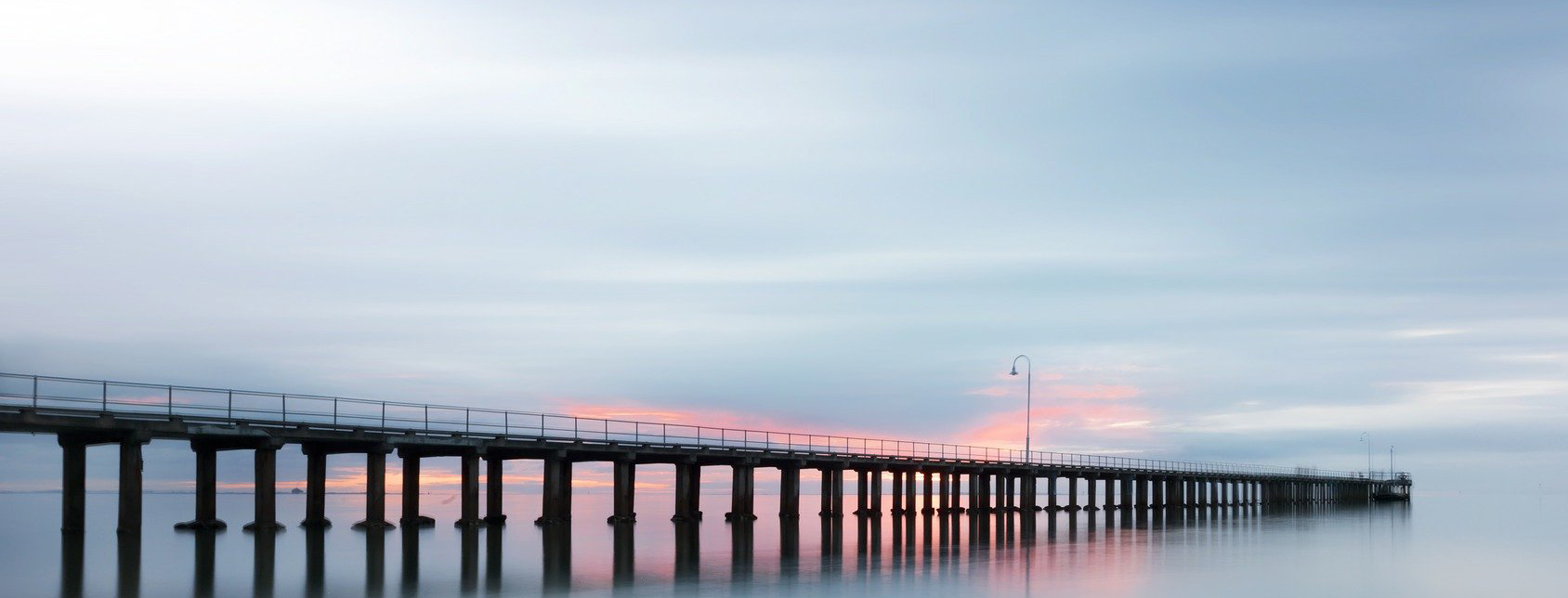 Long pier over the ocean
